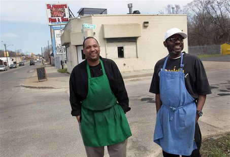 Kevin Ward (R) and Charlie Monagan, co-owners of Slabbee's Ribs & Soul, stand in front of their recently opened take-out rib joint in one of Kevin Ward (R) and Charlie Monagan, co-owners of Slabbee's Ribs & Soul, stand in front of their recently opened take-out rib joint in one of