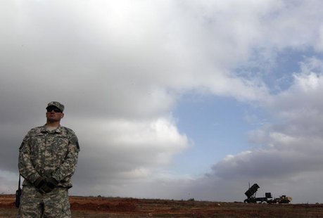 A U.S. soldier stands guard near a U.S. Patriot missile system at a Turkish military base in Gaziantep February 5, 2013. REUTERS/Osman Orsal A U.S. soldier stands guard near a U.S. Patriot missile system at a Turkish military base in Gaziantep February 5, 2013. REUTERS/Osman Orsal