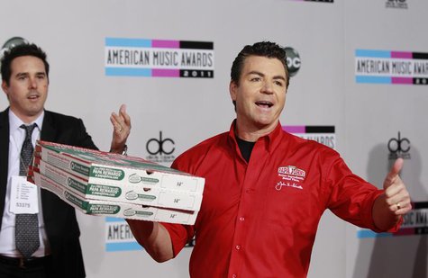 John Schnatter (R), founder and chief executive of Papa John's Pizza, arrives at the 2011 American Music Awards in Los Angeles November 20, John Schnatter (R), founder and chief executive of Papa John's Pizza, arrives at the 2011 American Music Awards in Los Angeles November 20,