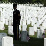 A member of the honor guard stands at attention as U.S. President Barack Obama arrives in his motorcade for Memorial Day observances at Arlington National Cemetery in Arlington, Virginia, May 27, 2013.
REUTERS/Jonathan Ernst
A member of the honor guard stands at attention as U.S. President Barack Obama arrives in his motorcade for Memorial Day observances at Arlington National Cemetery in Arlington, Virginia, May 27, 2013.
REUTERS/Jonathan Ernst