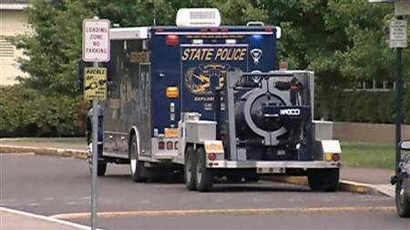 The Oregon State Police Explosives Unit removes explosives from the home of a 17-year-old West Albany High School student in Albany, Oregon on May 24, 2013 in this KGW Media Group photo released to Reuters on may 27, 2013. KGW Media Group/Handout via Reuters
The Oregon State Police Explosives Unit removes explosives from the home of a 17-year-old West Albany High School student in Albany, Oregon on May 24, 2013 in this KGW Media Group photo released to Reuters on may 27, 2013. KGW Media Group/Handout via Reuters