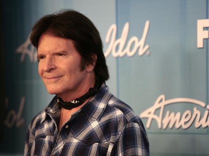 Singer John Fogerty poses in the backroom after performing at the 11th season finale of "American Idol" in Los Angeles, California, May 23, Singer John Fogerty poses in the backroom after performing at the 11th season finale of "American Idol" in Los Angeles, California, May 23,
