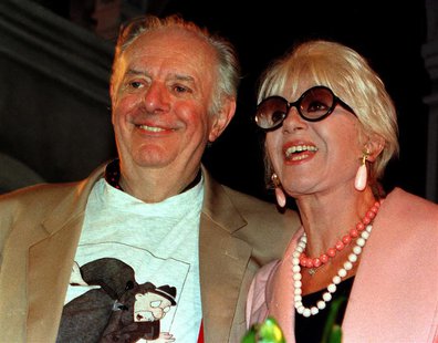 Italian playwright Dario Fo (L) and his wife Franca Rame pose prior to a news conference October 10, 1997. ITALY NOBEL Italian playwright Dario Fo (L) and his wife Franca Rame pose prior to a news conference October 10, 1997. ITALY NOBEL