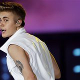 Canadian singer Justin Bieber performs on stage during a concert as part of his "Believe" World Tour at the Sevens Stadium in Dubai in this 
