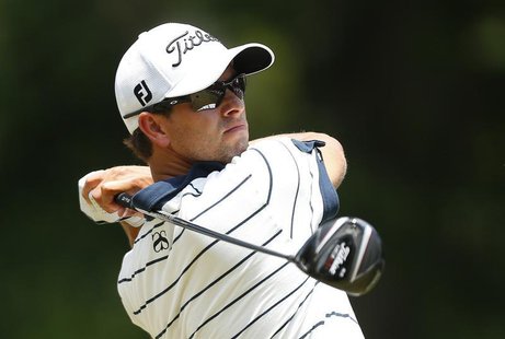Australia's Adam Scott tees off on the second hole during the third round of The Players Championship PGA golf tournament at TPC Sawgrass in Australia's Adam Scott tees off on the second hole during the third round of The Players Championship PGA golf tournament at TPC Sawgrass in