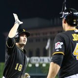 Pittsburgh's Neil Walker (L) is congratulated by fellow infielder Garrett Jones after his 11th inning homer gave the Pirates a 1-0 victory over the Detroit Tigers at Comerica Park on May 28, 2013. (photo courtesy Pittsburgh Pirates)