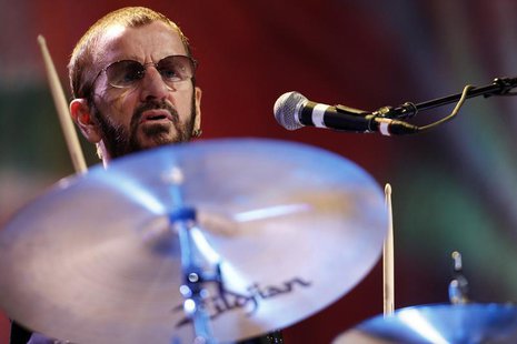Musician Ringo Starr performs during his concert at the Ulysses Guimaraes Convention Center in Brasilia November 18, 2011. REUTERS/Ueslei Ma Musician Ringo Starr performs during his concert at the Ulysses Guimaraes Convention Center in Brasilia November 18, 2011. REUTERS/Ueslei Ma