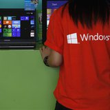 An attendant checks a computer during the launch of Microsoft Windows 8 operating system in Hong Kong October 26, 2012. REUTERS/Bobby Yip An attendant checks a computer during the launch of Microsoft Windows 8 operating system in Hong Kong October 26, 2012. REUTERS/Bobby Yip