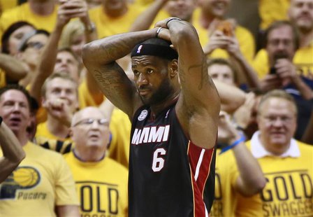 Miami Heat's LeBron James reacts after fouling out against the Indiana Pacers during the fourth quarter in Game 4 of their NBA Eastern Confe Miami Heat's LeBron James reacts after fouling out against the Indiana Pacers during the fourth quarter in Game 4 of their NBA Eastern Confe