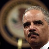 U.S. Attorney General Eric Holder looks out during a special naturalization ceremony at the Department of Justice in Washington May 28, 2013