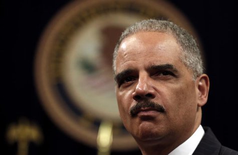 U.S. Attorney General Eric Holder looks out during a special naturalization ceremony at the Department of Justice in Washington May 28, 2013 U.S. Attorney General Eric Holder looks out during a special naturalization ceremony at the Department of Justice in Washington May 28, 2013