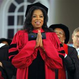 Media mogul Oprah Winfrey acknowledges the cheers from students and audience as she receives an honorary Doctor of Laws degree during Harvar Media mogul Oprah Winfrey acknowledges the cheers from students and audience as she receives an honorary Doctor of Laws degree during Harvar