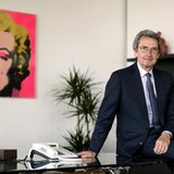 Franco Bernabe, Telecom Italia chairman and CEO, poses in his office in Rome, April 19, 2013. REUTERS/Alessandro Bianchi