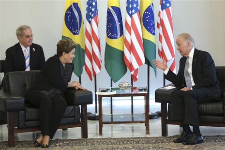 U.S. Vice President Joe Biden (R) speaks to Brazil's President Dilma Rousseff during a meeting on his visit to Brazil, at the Planalto Palac U.S. Vice President Joe Biden (R) speaks to Brazil's President Dilma Rousseff during a meeting on his visit to Brazil, at the Planalto Palac