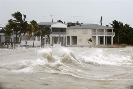Strong waves crash around coastal houses in Key West, Florida, as Hurricane Ike passes to the south in this September 9, 2008 file photo. RE Strong waves crash around coastal houses in Key West, Florida, as Hurricane Ike passes to the south in this September 9, 2008 file photo. RE