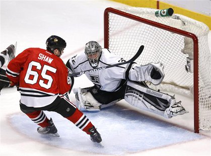 Los Angeles Kings goalie Jonathan Quick stops Chicago Blackhawks' Andrew Shaw in the second period of Game 1 of their NHL Western Conference Los Angeles Kings goalie Jonathan Quick stops Chicago Blackhawks' Andrew Shaw in the second period of Game 1 of their NHL Western Conference