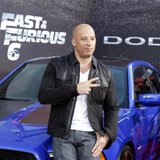 Cast member and producer Vin Diesel poses at the premiere of the new film, "Fast & Furious 6" at Universal Citywalk in Los Angeles May 21, 2