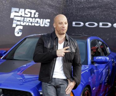 Cast member and producer Vin Diesel poses at the premiere of the new film, "Fast & Furious 6" at Universal Citywalk in Los Angeles May 21, 2 Cast member and producer Vin Diesel poses at the premiere of the new film, "Fast & Furious 6" at Universal Citywalk in Los Angeles May 21, 2