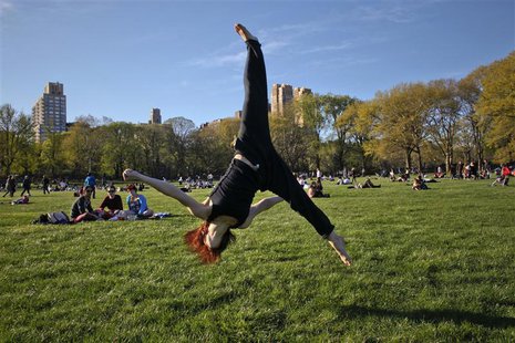 A woman practices aerobic moves in New York's Central Park on April 8, 2012. REUTERS/Eduardo Munoz A woman practices aerobic moves in New York's Central Park on April 8, 2012. REUTERS/Eduardo Munoz