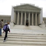 Tourists walk in front of the Supreme Court building in Washington, March 24, 2013. REUTERS/Jonathan Ernst Tourists walk in front of the Supreme Court building in Washington, March 24, 2013. REUTERS/Jonathan Ernst