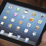 An illustration picture shows application icons on an Apple Ipad tablet held by a woman in Bordeaux, Southwestern France, February 4, 2013. An illustration picture shows application icons on an Apple Ipad tablet held by a woman in Bordeaux, Southwestern France, February 4, 2013.