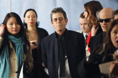 Musician Lou Reed (C) arrives for the Metropolitan Opera's premiere of "Le Comte Ory" at Lincoln Center in New York March 24, 2011. REUTERS/ Musician Lou Reed (C) arrives for the Metropolitan Opera's premiere of "Le Comte Ory" at Lincoln Center in New York March 24, 2011. REUTERS/