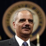 U.S. Attorney General Eric Holder looks on during a special naturalization ceremony at the Department of Justice in Washington May 28, 2013. U.S. Attorney General Eric Holder looks on during a special naturalization ceremony at the Department of Justice in Washington May 28, 2013.