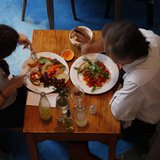 A couple lunches at vegetarian restaurant Artemisia in Buenos Aires July 7, 2010. REUTERS/Martin Acosta