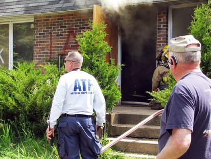 ATF officials oversee a training burn in Wausau, June 3 2013 ATF officials oversee a training burn in Wausau, June 3 2013
