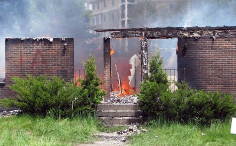 The remains of a blighted apartment building burn after Wausau and ATF fire crews complete training on the structure, June 3 2013 The remains of a blighted apartment building burn after Wausau and ATF fire crews complete training on the structure, June 3 2013