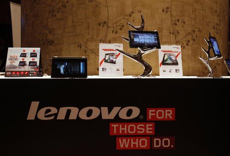 Lenovo tablets and mobile phones are displayed during a news conference on the company's annual results in Hong Kong May 23, 2013. REUTERS/B Lenovo tablets and mobile phones are displayed during a news conference on the company's annual results in Hong Kong May 23, 2013. REUTERS/B