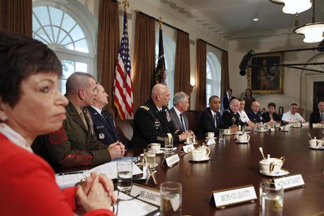 Senior White House Advisor Valerie Jarrett (L) attends a meeting with U.S. President Barack Obama (C) on sexual assault in the military at t Senior White House Advisor Valerie Jarrett (L) attends a meeting with U.S. President Barack Obama (C) on sexual assault in the military at t