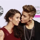 Pop star Justin Bieber (R) arrives with his mother Pattie Mallette at the 40th American Music Awards in Los Angeles, California November 18, Pop star Justin Bieber (R) arrives with his mother Pattie Mallette at the 40th American Music Awards in Los Angeles, California November 18,