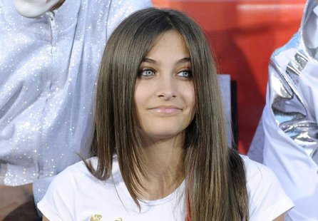 Michael Jackson's daughter Paris attends a ceremony where the singer's shoes and gloves are used to make hand and foot imprints in cement in Michael Jackson's daughter Paris attends a ceremony where the singer's shoes and gloves are used to make hand and foot imprints in cement in