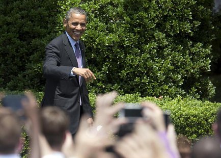 U.S. President Barack Obama waves to fans before honoring the Baltimore Ravens team and their Super Bowl XLVII victory on the South Lawn of U.S. President Barack Obama waves to fans before honoring the Baltimore Ravens team and their Super Bowl XLVII victory on the South Lawn of