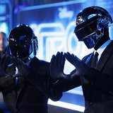 Musicians Thomas Banglater and Guy-Manuel de Homem-Christo of Daft Punk pose at the world premiere of the film "TRON: Legacy" in Hollywood, 