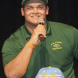 Eddie Vanderdoes signing letter of intent for Notre Dame.