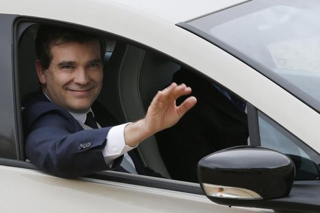 French Minister for Industrial Recovery Arnaud Montebourg waves goodbye after attending a ministers' meeting at the Elysee Palace in Paris M French Minister for Industrial Recovery Arnaud Montebourg waves goodbye after attending a ministers' meeting at the Elysee Palace in Paris M