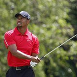 Tiger Woods of the U.S. watches his second shot on the 10th hole during the final round of the Memorial Tournament at Muirfield Village Golf Tiger Woods of the U.S. watches his second shot on the 10th hole during the final round of the Memorial Tournament at Muirfield Village Golf