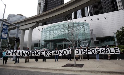 A group of labour activists protest in front of General Motors (GM) headquarters during the company's annual shareholders meeting in Detroit A group of labour activists protest in front of General Motors (GM) headquarters during the company's annual shareholders meeting in Detroit