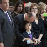 (L - R) New Jersey Governor Chris Christie, Senator Frank Lautenberg's son Josh, grandson Sam and wife Bonnie look on as Frank Lautenberg's (L - R) New Jersey Governor Chris Christie, Senator Frank Lautenberg's son Josh, grandson Sam and wife Bonnie look on as Frank Lautenberg's