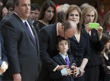 (L - R) New Jersey Governor Chris Christie, Senator Frank Lautenberg's son Josh, grandson Sam and wife Bonnie look on as Frank Lautenberg's (L - R) New Jersey Governor Chris Christie, Senator Frank Lautenberg's son Josh, grandson Sam and wife Bonnie look on as Frank Lautenberg's