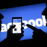 A smartphone user shows the Facebook application on his phone in the central Bosnian town of Zenica, in this photo illustration, May 2, 2013 A smartphone user shows the Facebook application on his phone in the central Bosnian town of Zenica, in this photo illustration, May 2, 2013