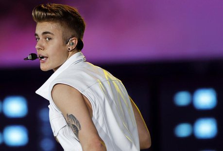 Canadian singer Justin Bieber performs on stage during a concert as part of his "Believe" World Tour at the Sevens Stadium in Dubai May 4, 2 Canadian singer Justin Bieber performs on stage during a concert as part of his "Believe" World Tour at the Sevens Stadium in Dubai May 4, 2