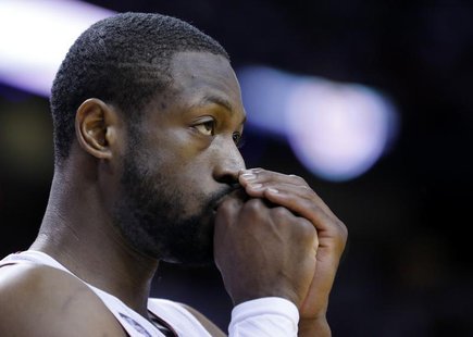 Miami Heat's Dwyane Wade pauses during play against the Chicago Bulls during the second quarter in Game 5 of their NBA Eastern Conference se Miami Heat's Dwyane Wade pauses during play against the Chicago Bulls during the second quarter in Game 5 of their NBA Eastern Conference se