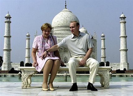 Russian President Vladimir Putin and his wife Lyudmila sit in front of the Taj Mahal while touring the city of Agra in this October 4, 2000 Russian President Vladimir Putin and his wife Lyudmila sit in front of the Taj Mahal while touring the city of Agra in this October 4, 2000