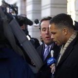 Former U.S. Rep. Jesse Jackson, Jr. (D-IL) (R) departs the U.S. District Federal Courthouse in Washington February 20, 2013. REUTERS/Gary Ca Former U.S. Rep. Jesse Jackson, Jr. (D-IL) (R) departs the U.S. District Federal Courthouse in Washington February 20, 2013. REUTERS/Gary Ca
