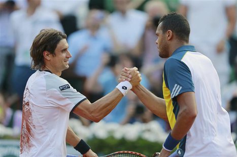 David Ferrer (L) of Spain shakes hands with Jo-Wilfried Tsonga of France after winning their men's singles semi-final match during the Frenc David Ferrer (L) of Spain shakes hands with Jo-Wilfried Tsonga of France after winning their men's singles semi-final match during the Frenc