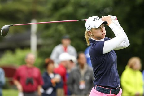 Morgan Pressel of the U.S. tees off on the 18th hole during round one of the LPGA Golf Championship in Pittsford, New York June 7, 2013. REU Morgan Pressel of the U.S. tees off on the 18th hole during round one of the LPGA Golf Championship in Pittsford, New York June 7, 2013. REU