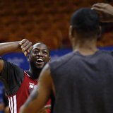 Miami Heat players Dwyane Wade (L) and Rashard Lewis react during a team practice ahead of Game 2 of the NBA Finals basketball playoff again Miami Heat players Dwyane Wade (L) and Rashard Lewis react during a team practice ahead of Game 2 of the NBA Finals basketball playoff again